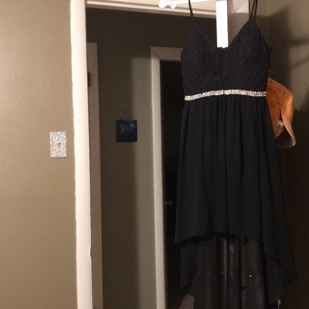 A black high low dress.